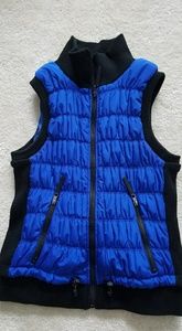 - VERY BEAUTIFUL Calvin Klein Vest red and blue one.